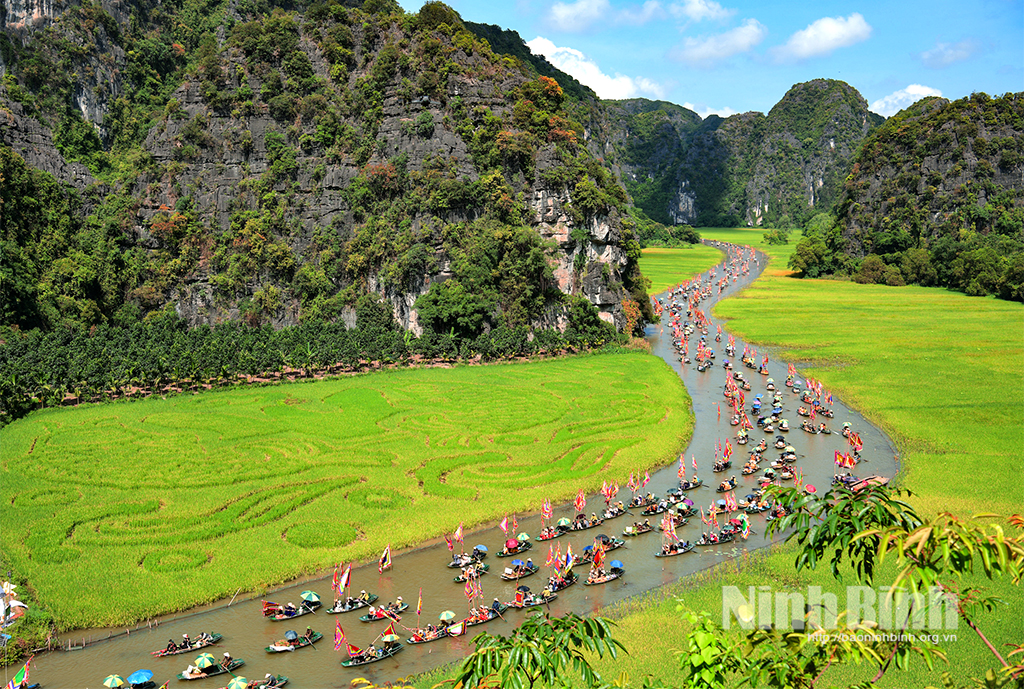 Tourists visit Tam Coc area.