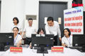 Leaders of Yen Hoa ward in Hanoi inspect the IT system on the first day of piloting the two-tier local administration model. (Photo: VNA)