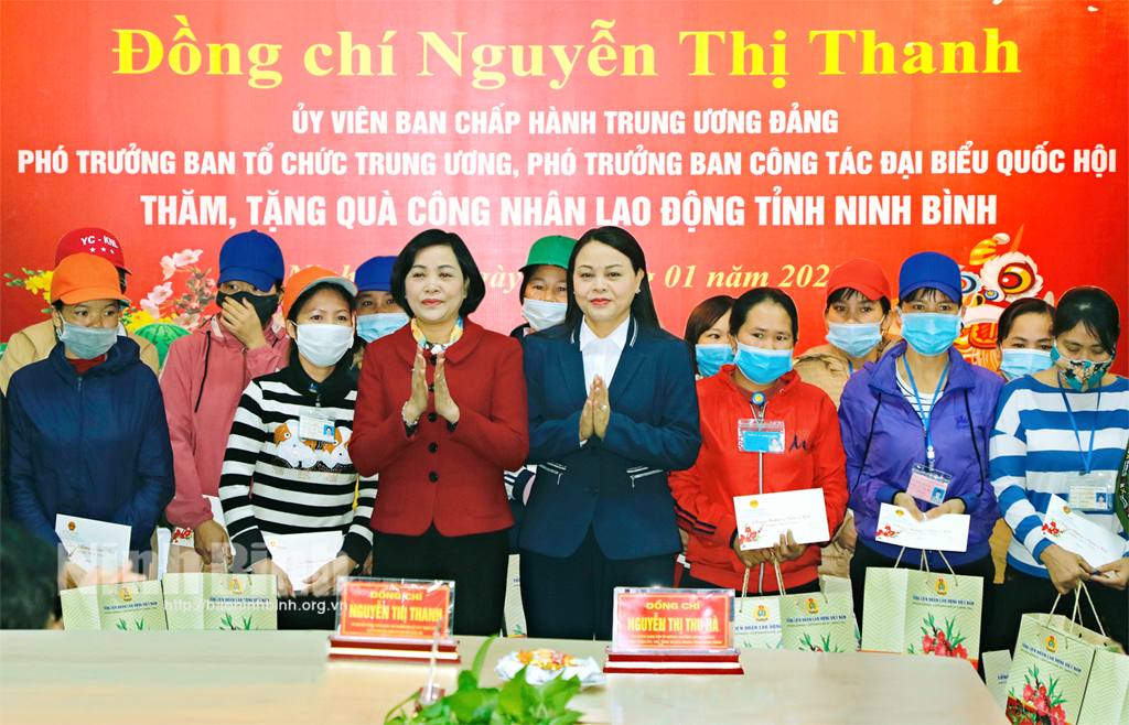 Presenting Tet gifts to poor workers in Athena footwear Ltd company.