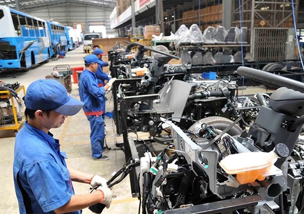 Assembling cars at Saigon Transportation Mechanical Corporation (Samco).