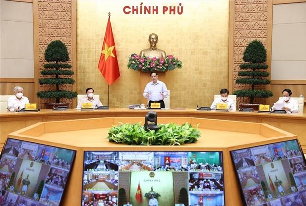 PM Pham Minh Chinh chairs a national teleconference between the National Steering Committee for COVID-19 Prevention and Control, and localities on the fight against the pandemic. (Photo: VNA)