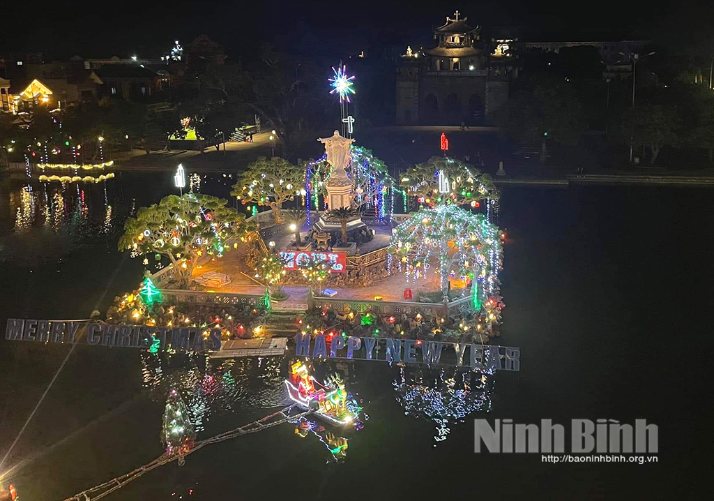 Phat Diem Cathedral in Kim Son district sparks at night.