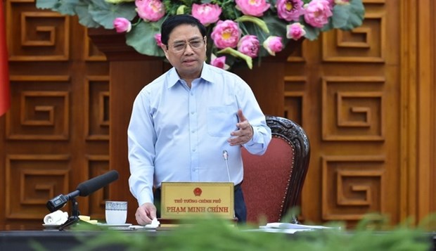 Prime Minister Pham Minh Chinh speaks at the meeting
