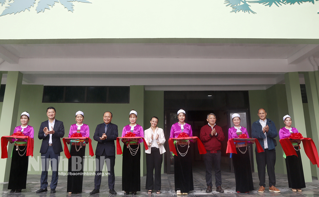 At the ribbon-cutting ceremony