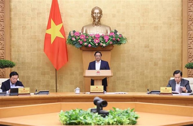 PM Pham Minh Chinh addresses the Government's regular meeting for November in Hanoi on December 6. (Photo: VNA)