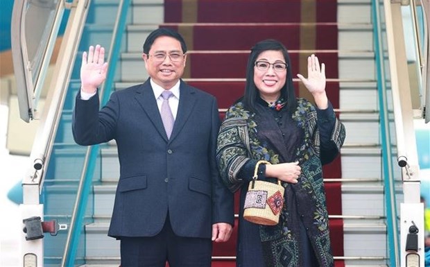 Prime Minister Pham Minh Chinh and his spouse (Photo: VNA)