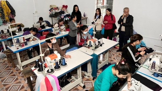 Many people with disabilities in the mountainous district of Nho Quan, Ninh Binh, have been supported with sewing machines to earn stable jobs and increase their incomes. (Photo: nhandan.vn)