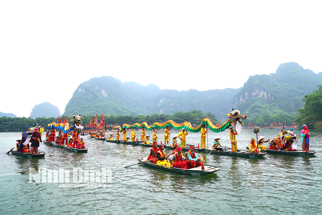 Dragon boat procession at the festival.